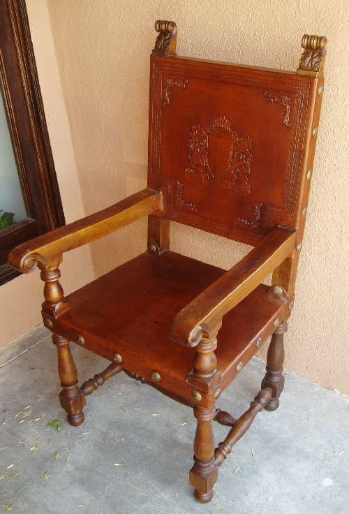 hand tooled leather armchair family crest